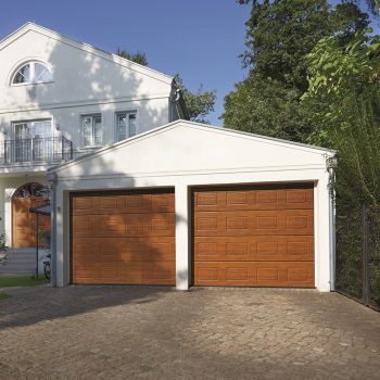 Two Wooden Sectional Garage Doors