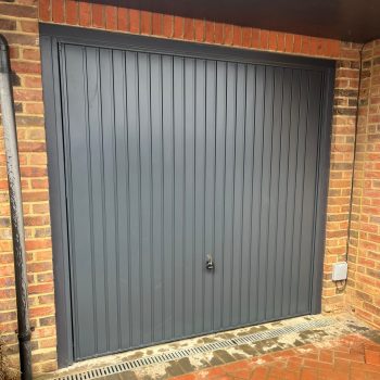 Electric up and over garage door