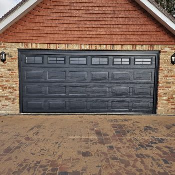 Teckentrup Georgian Woodgrain Insulated Sectional door in Black